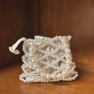 Elegant Pearl-Embellished Cream Bag